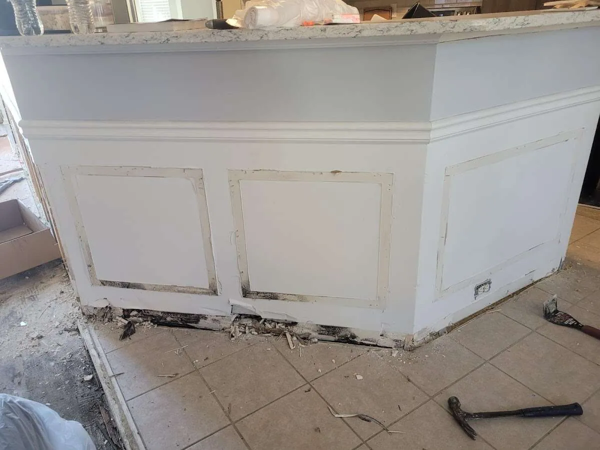 Water damage and mold on kitchen during Sewage Cleanup & Sanitation in Uvalde